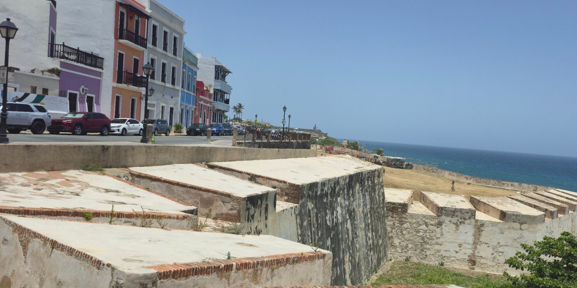 Colorful colonial houses above the old city walls and a garita sentry box in Old San Juan